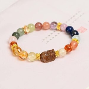 Materials: Black Gold Rutilated Quartz, Red Resin Flower, Aquamarine, Yellow Quartz, Rose Quartz, Amethyst, Strawberry Quartz, Alloy